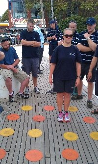 A group of navy personnel navigating their way through a maze on a tall ship deck (Mar 2012) ...